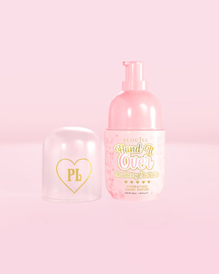 Pink bottle of P.Louise Hand It Over hydrating hand serum in strawberry shortcake scent 