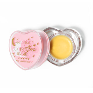 Pink heart-shaped lip sleeping mask with the lid off on a white background