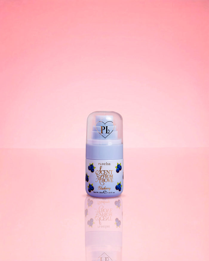 P.Louise Blueberry Mini Scent From Above Body Mist on a pink background