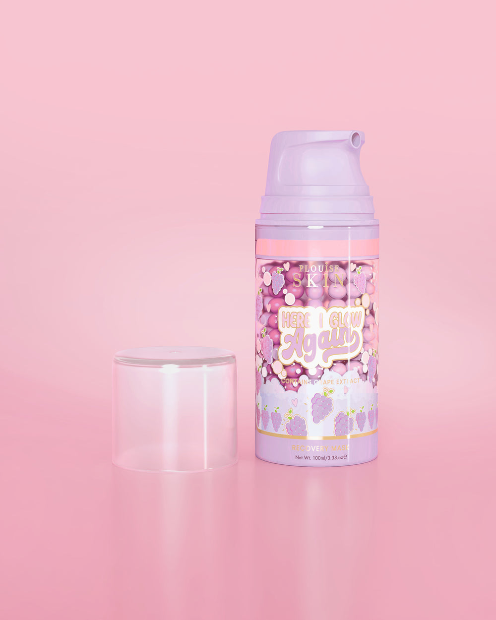 Purple bottle of P. Louise Here I Glow Again Grape Recovery Mask on a pink background