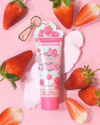 P. Louise A Helping Hand Hand Cream with strawberries on a pink background