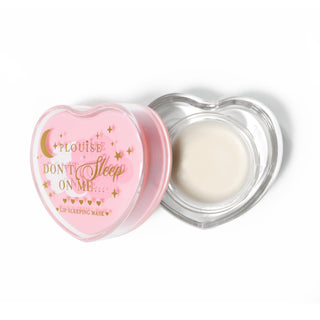 Pink heart-shaped lip sleeping mask in white against a white background